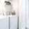 a bathroom with a laundry area