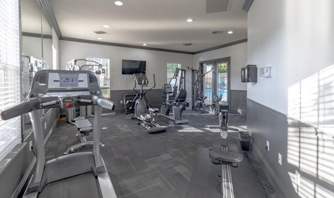 Quick access to state-of-the-art amenities a gym with exercise equipment